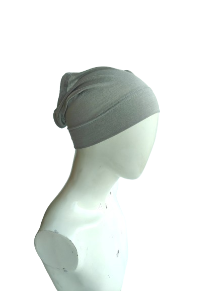 Gray beanie on a mannequin head against a white background