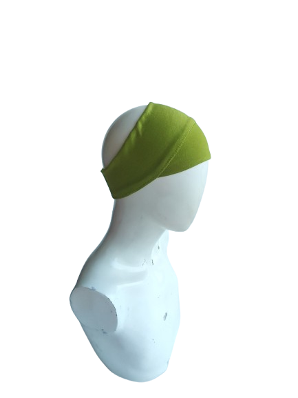 Green headband on a mannequin head against a white background