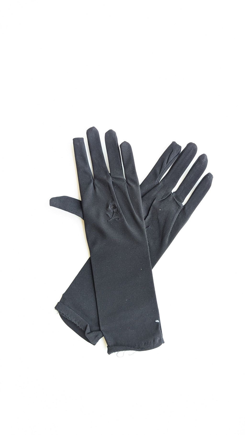 Pair of black gloves for girls