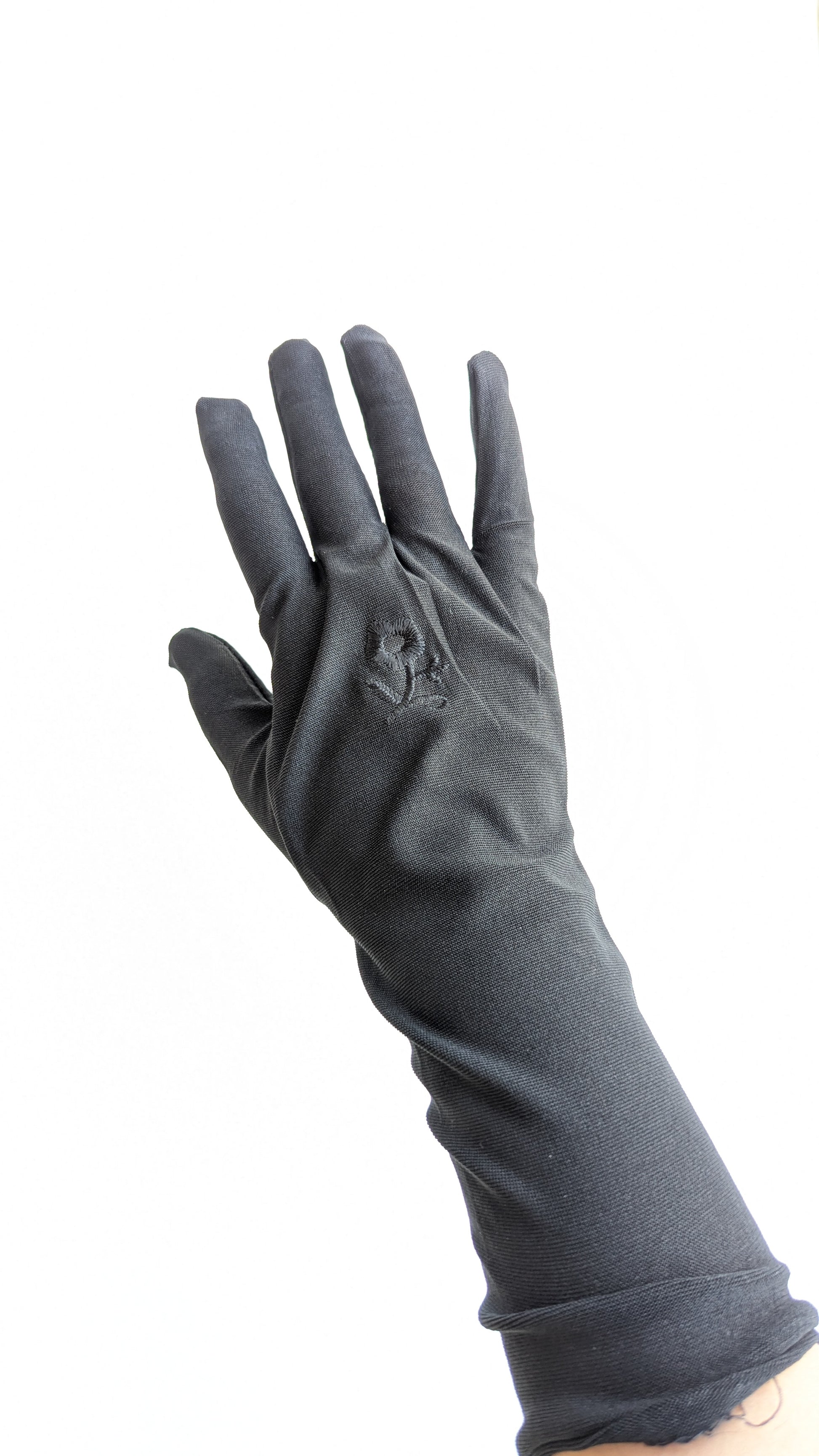 Pair of black gloves for girls